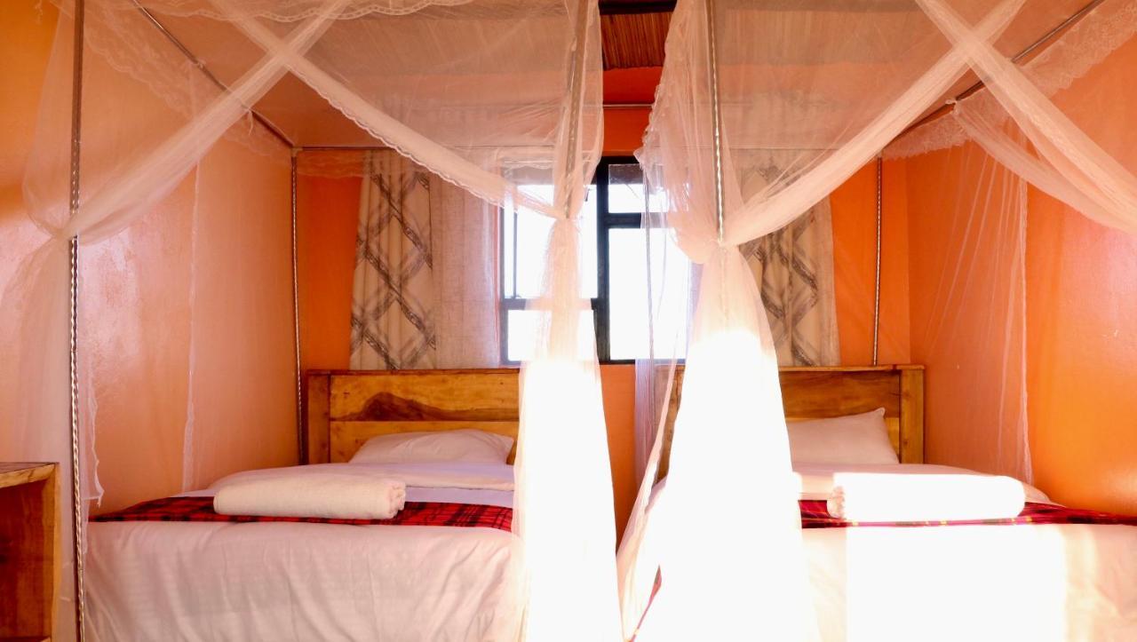 Апартаменты Amboseli Redhouse Экстерьер фото
