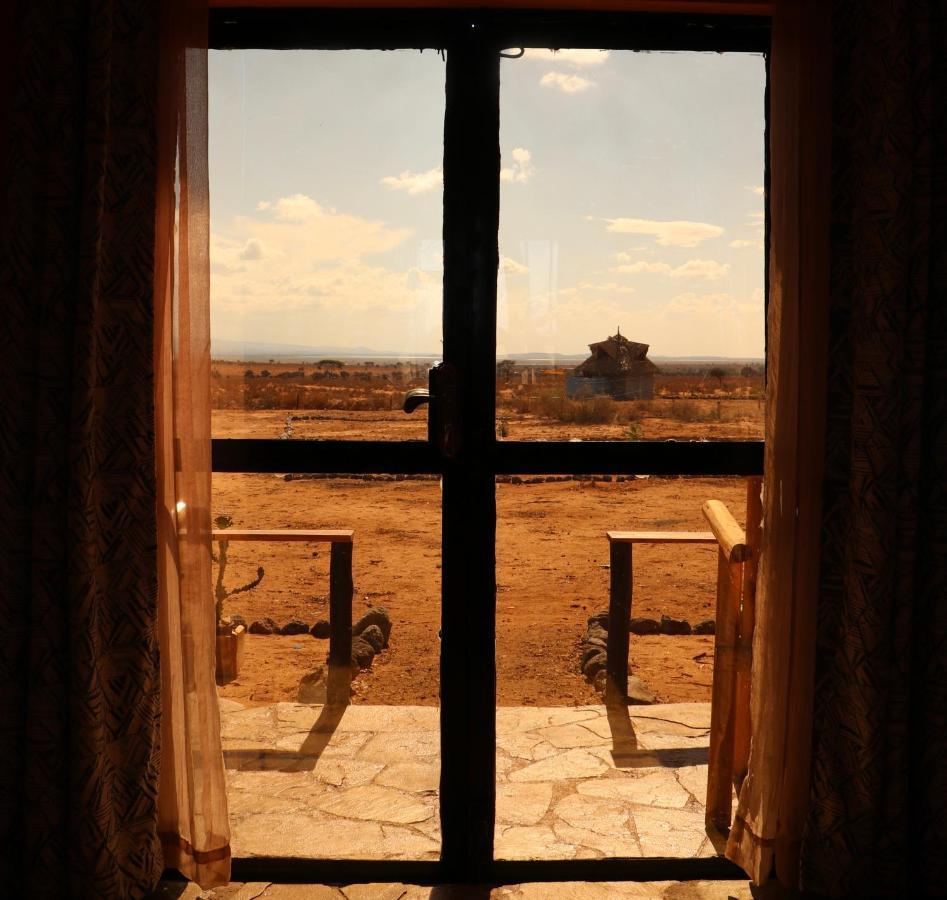 Апартаменты Amboseli Redhouse Экстерьер фото