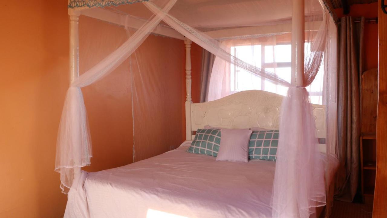 Апартаменты Amboseli Redhouse Экстерьер фото